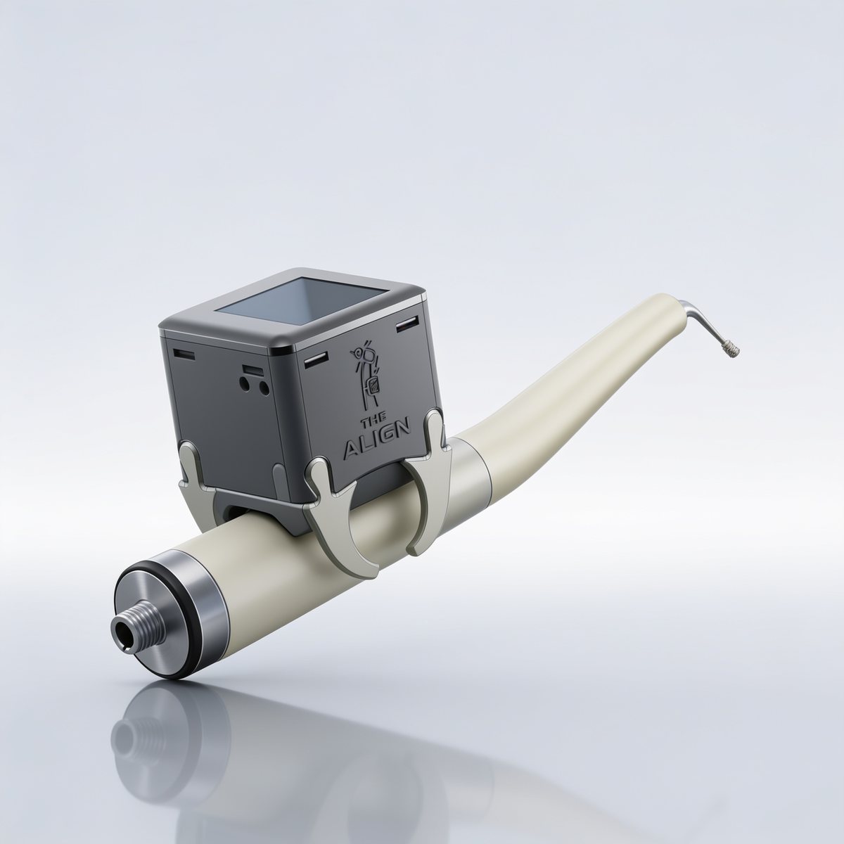 The Align clamped onto a dental handpiece by its two silicone grips